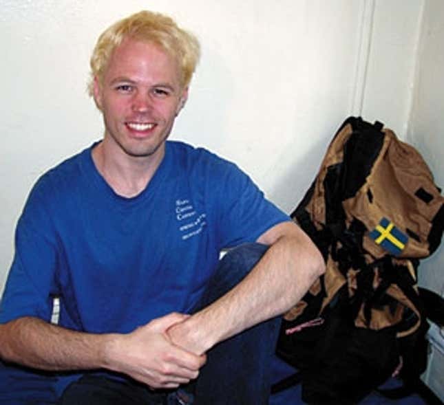 The much-laid Perssen sits on his bed at the hostel.