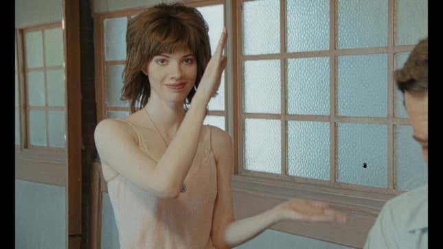 The character Marissa Marcel claps her hands together in the game Immortality.