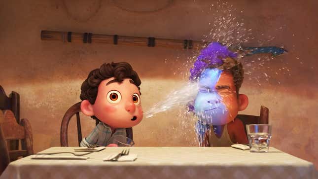 A screenshot from the Luca trailer of Luca spitting water at Antonio, who is half-transformed into a sea monster