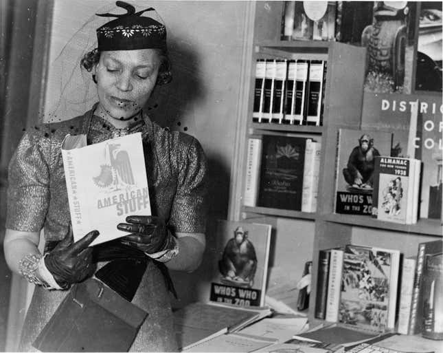 Zora Neale Hurston (1891-1960) at a book fair, New York, New York, circa 1937.