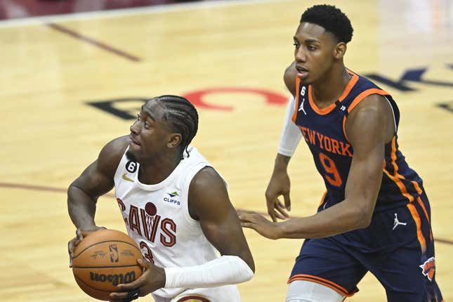 Apr 15, 2023; Cleveland, Ohio, USA; Cleveland Cavaliers guard Caris LeVert (3) drives past New York Knicks guard RJ Barrett (9) in the second quarter of game one of the 2023 NBA playoffs at Rocket Mortgage FieldHouse.