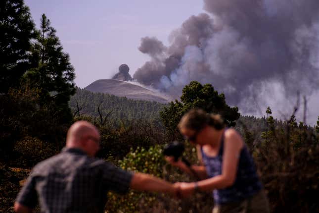 Smoke rises from a volcano on the Canary Island of La Palma, Spain on Friday Oct. 1, 2021. 