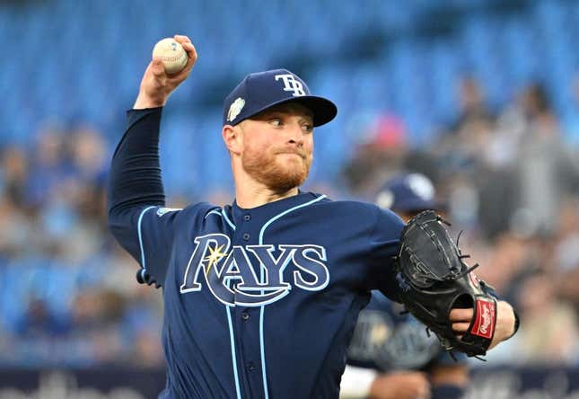 Apr 14, 2023; Toronto, Ontario, CAN; Tampa Bay Rays starting pitcher Drew Rasmussen (57) delivers a pitch against the Toronto Blue Jays in the first inning at Rogers Centre.