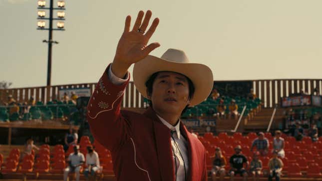 Yeun in a cowboy hat