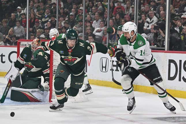 Apr 28, 2023; Saint Paul, Minnesota, USA; Minnesota Wild defenseman John Klingberg (3) and Dallas Stars left wing Jamie Benn (14) in action during the first period in game six of the first round of the 2023 Stanley Cup Playoffs at Xcel Energy Center.