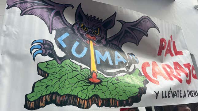 This sign reads “LUMA go to hell” and depicts the energy authority as a vampire bat sucking the blood out of Puerto Rico. August 25, 2022. 