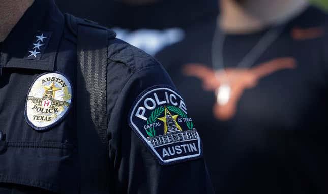 Members of the Austin police department march with members of the University of Texas football team to the State Capitol in Austin, on Thursday, June 4, 2020, to protest the death of George Floyd, an African American man who died on May 25 after a white Minneapolis police officer pressed a knee into his neck for several minutes even after he stopped moving and pleading for air. The department is now at the center of debates over police reform and policy, with 18 officers possibly facing charges for excessive force during the 2020 protests.