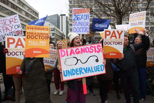 Junior doctors and supporters take part in a demonstration outside St Thomas' Hospital, during a strike over pay on March 13, 2023 in London, England.