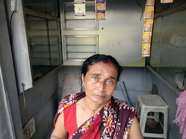 Roma Dey, whose paan and cigarette shop at Trimohini, Basirhat, was broken into and looted.