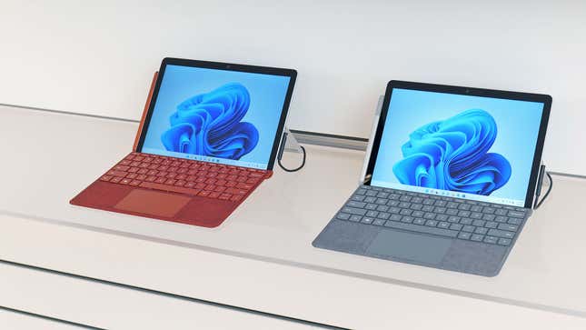 A photo of two Microsoft Surface Go 3 devices, one in red and one in gray 