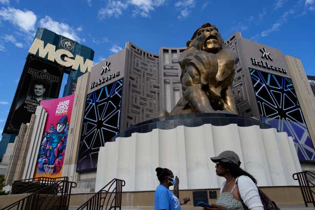 People walk by the MGM Grand hotel-casino Wednesday, Sept. 13, 2023, in Las Vegas. A &quot;cybersecurity issue&quot; led to the shutdown of some casino and hotel computer systems at MGM Resorts International properties across the U.S., a company official reported Monday, Sept. 11, 2023. (AP Photo/John Locher)