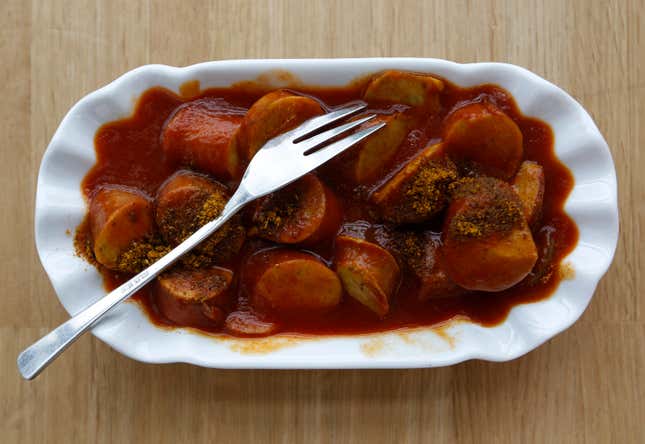 A typical German fast food dish of 'Currywurst', which is a sausage with curry powder and ketchup served is pictured at a takeaway in Dortmund