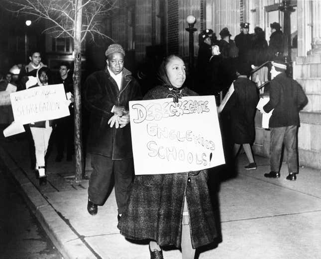 Pickets march in front of City Hall in Englewood, New Jersey on Feb. 7, 1962 during meeting of City Council at which this year’s school budget was adopted. African American leadership in the community is protesting what it claims is segregation in the elementary school system.