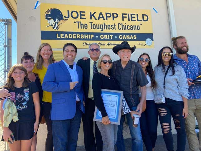 Joe Kapp and his family gather by a field sign created to honor the former NFL player&#39;s legacy at El Sausal Middle School in Salinas, Calif.

Jkappfamily