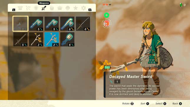 An in-game menu shows Link shivering in the cold.