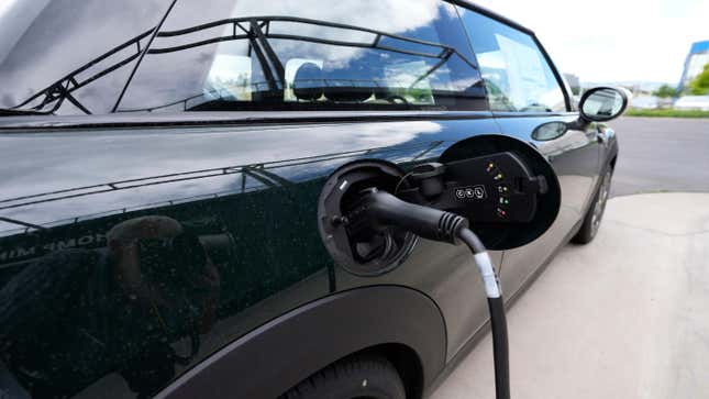 A 2023 Cooper SE resolute editons electric vehicle is charged outside a Mini dealership Thursday, July 7, 2022, in Highlands Ranch, Colorado. 