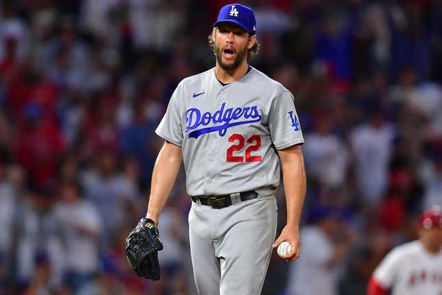 Jun 20, 2023; Anaheim, California, USA; Los Angeles Dodgers starting pitcher Clayton Kershaw (22) reacts after the home plate video review on Los Angeles Angels right fielder Hunter Renfroe (12) is overturned in the fourth inning at Angel Stadium.