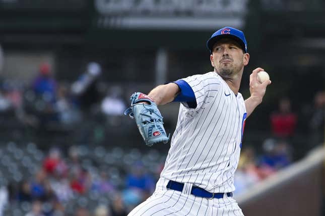 Jun 14, 2023; Chicago, Illinois, USA;  Chicago Cubs starting pitcher Drew Smyly (11) delivers against the Pittsburgh Pirates during the first inning at Wrigley Field.
