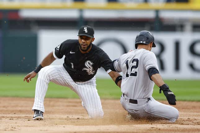 Aug 9, 2023; Chicago, Illinois, USA; New York Yankees center fielder Isiah Kiner-Falefa (12) is caught stealing second base by Chicago White Sox shortstop Elvis Andrus (1) during the second inning at Guaranteed Rate Field.