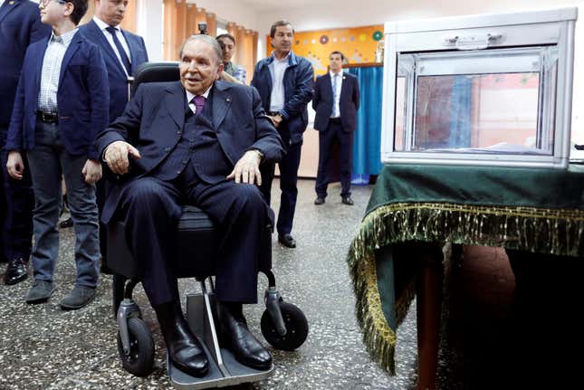 Algeria's President Abdelaziz Bouteflika looks at journalists after casting his ballot during the parliamentary election in Algiers, Algeria, May 4, 2017.