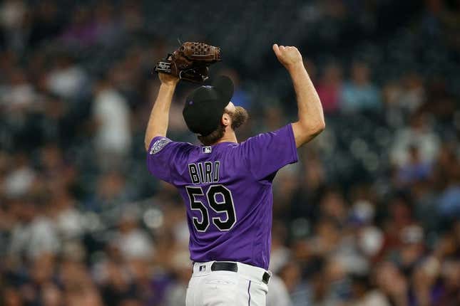 May 22, 2023; Denver, Colorado, USA; Colorado Rockies relief pitcher Jake Bird (59) reacts at the end of the seventh inning against the Miami Marlins at Coors Field.