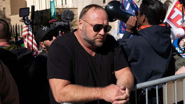 Alex Jones, host of Infowars, an extreme right-wing program that often trafficks in conspiracy theories, is seen at a "Stop the Steal" rally against the results of the U.S. Presidential election outside the Georgia State Capitol on November 18, 2020