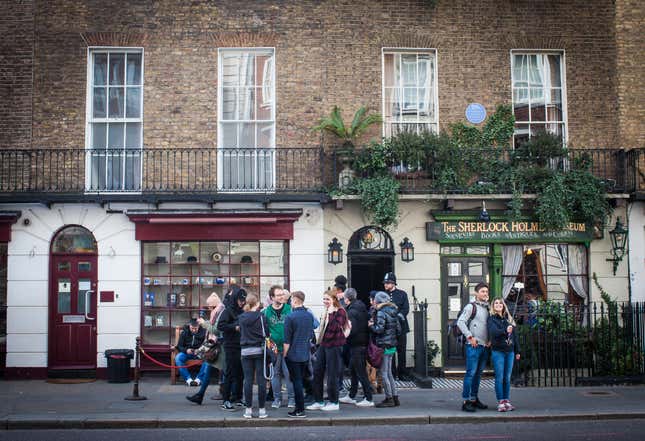Tourists gather in front of the Sherlock Holmes museum.