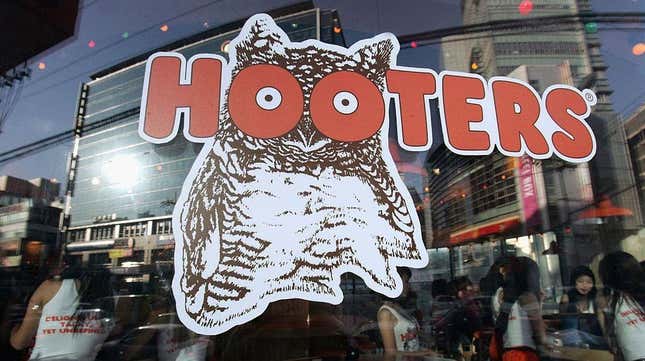 Hooters restaurant window sign