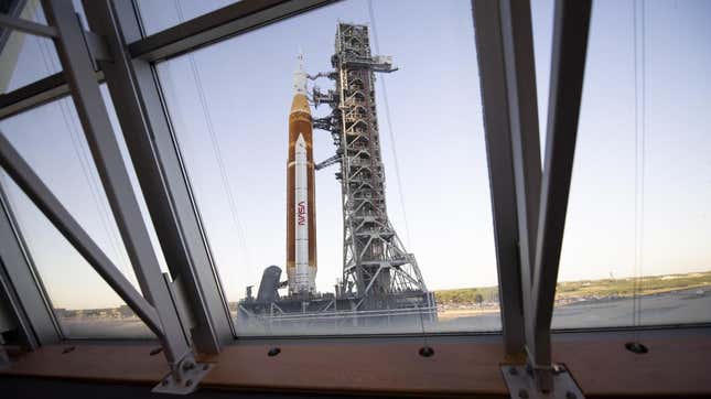 NASA’s SLS rocket as seen through the windows of Firing Room One in the Rocco A. Petrone Launch Control Center at Kennedy Space Center, Florida. 
