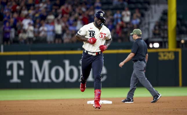 May 19, 2023; Arlington, Texas, USA;  TTexas Rangers right fielder Adolis Garcia (53) runs the bases after hitting a two-run home run during the fourth inning against the Colorado Rockies at Globe Life Field.