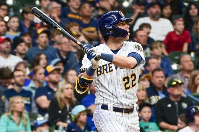 May 13, 2023; Milwaukee, Wisconsin, USA; Milwaukee Brewers left fielder Christian Yelich (22) hits a 2-run home run in the third inning against the Kansas City Royals at American Family Field.