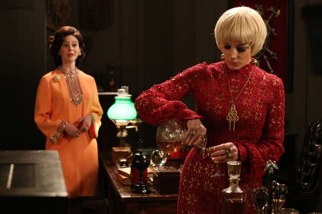 Arlene (Joanna Going) and Megan Draper (Jessica Pare) - Mad Men _ Season 6, Episode 9 _ 'The Better Half' - Photo Credit: Michael Yarish/AMC