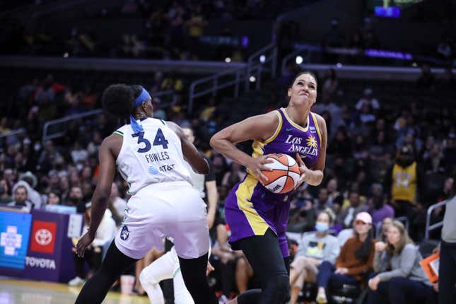 Los Angeles Sparks center Liz Cambage (1) guarded by Minnesota Lynx center Sylvia Fowles (34) during the Minnesota Lynx vs Los Angeles Sparks game on May 17, 2022, the at Crypto.com Arena in Los Angeles, CA.