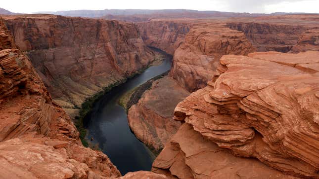A view of the Colorado River as it flows around Horseshoe Bend on June 23, 2021 in Page, Arizona.