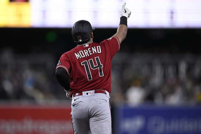 Aug 19, 2023; San Diego, California, USA; Arizona Diamondbacks catcher Gabriel Moreno (14) rounds the bases after hitting a grand slam home run against the San Diego Padres during the seventh inning at Petco Park.