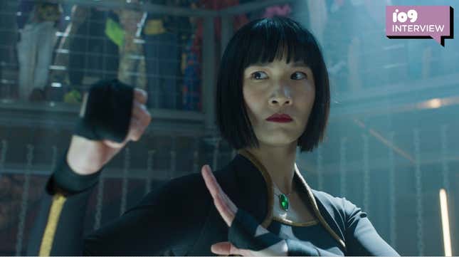 Meng'er Zhang's Xialing from Marvel's Shang-Chi wears a cropped haircut with bangs and stands ready to fight.