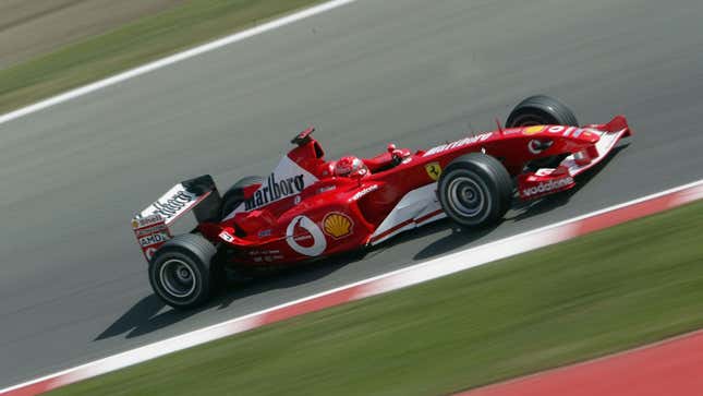 A photo of Michael Schumacher in his 2003 Ferrari f1 car. 