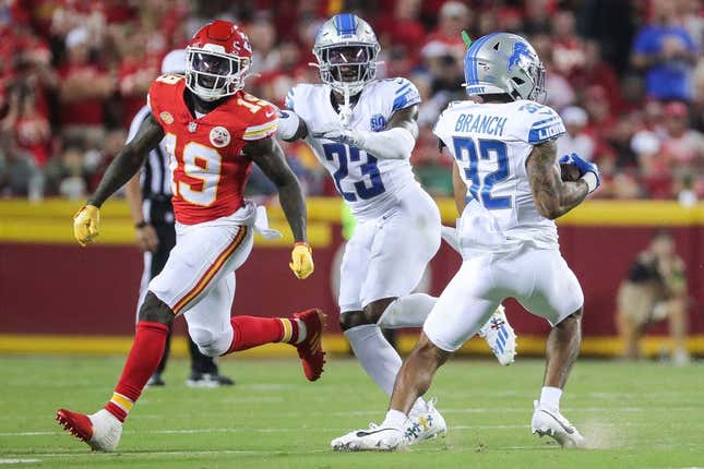 Detroit Lions safety Brian Branch (32) catches an interception from Kansas City Chiefs quarterback Patrick Mahomes (15) during the second half at Arrowhead Stadium in Kansas City, Mo. on Thursday, Sept. 7, 2023.