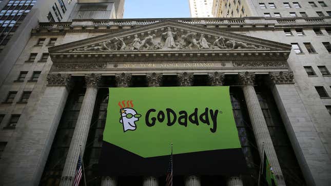 The GoDaddy banner hangs outside of the New York Stock Exchange as the website hosting service makes its initial public offering (IPO) on April 1, 2015 in New York City.