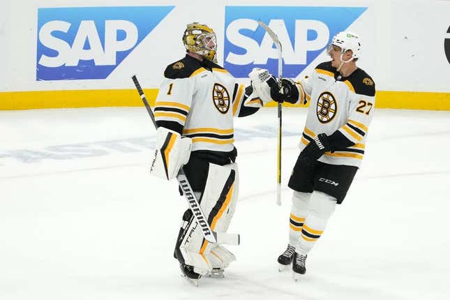 Apr 23, 2023; Sunrise, Florida, USA; Boston Bruins defenseman Hampus Lindholm (27) celebrates with Boston Bruins goaltender Jeremy Swayman (1) after defeating the Florida Panthers in game four of the first round of the 2023 Stanley Cup Playoffs at FLA Live Arena.