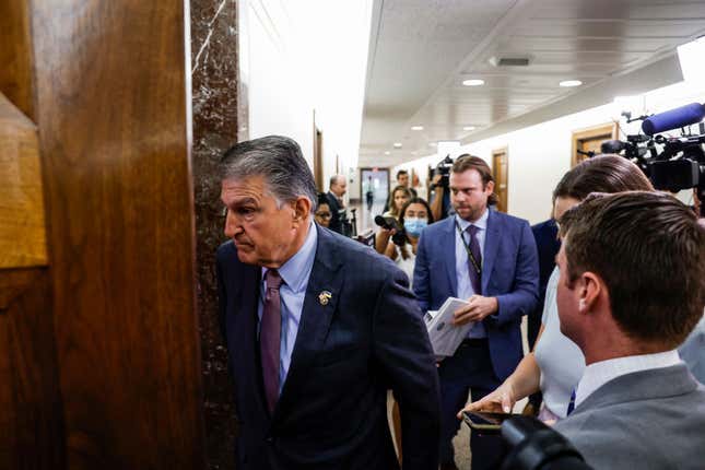 Senate Energy and Natural Resources Committee Chairman Joe Manchin (D-WV) arrives to athearing at the Dirksen Senate Office Building on July 19, 2022, in Washington, DC. 