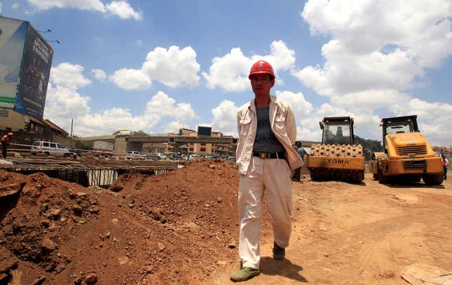 A Chinese contractor walks at the site of the Nairobi-Thika highway project near Kenya's capital Nairobi.