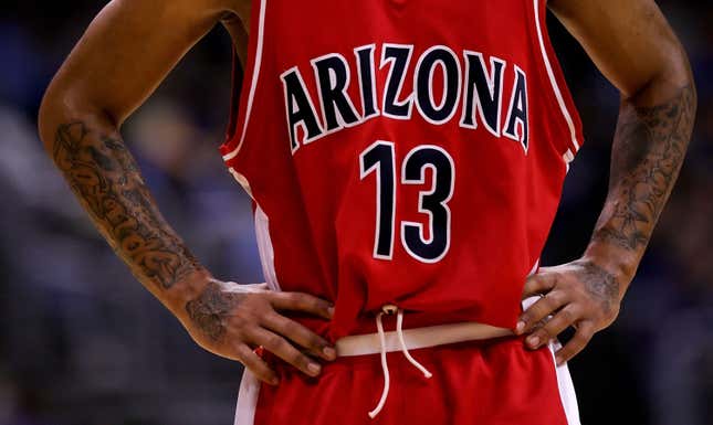 A detail shot of the tattoos of Chris Rodgers #13 of the Arizona Wildcats during the final moments of their loss to the UCLA Bruins in the semifinals of the 2006 Pacific Life Pac-10 Men’s Basketball Tournament on March 10, 2006 at Staples Center in Los Angeles, California. UCLA defeated Arizona 71-59. 
