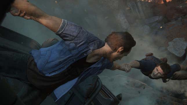 Nathan Drake's brother grabs him as they hang off a cliff.