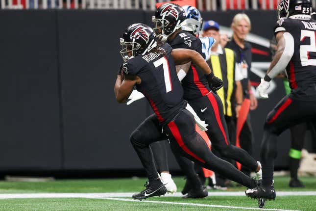 Sep 10, 2023; Atlanta, Georgia, USA; Atlanta Falcons running back Bijan Robinson (7) runs after a catch for a touchdown against the Carolina Panthers in the second quarter at Mercedes-Benz Stadium.
