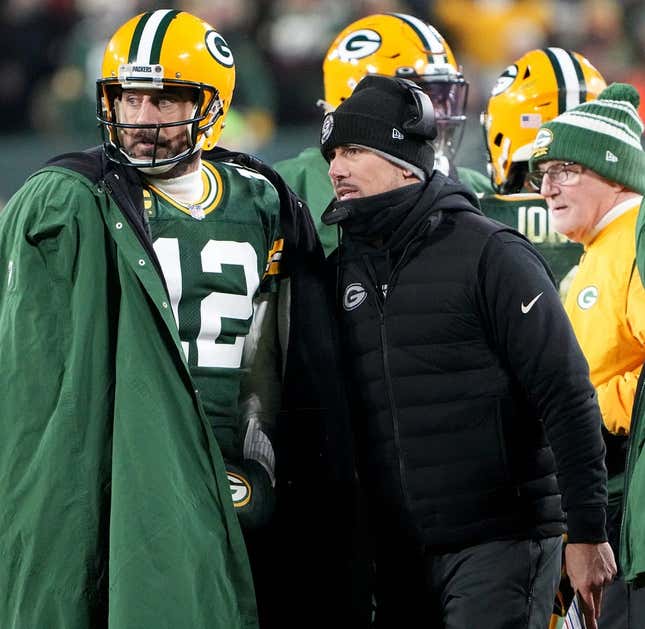 Green Bay Packers quarterback Aaron Rodgers (12) talks with head coach Matt LaFleur during the fourth quarter of their game Monday, December 19, 2022 at Lambeau Field in Green Bay, Wis. The Green Bay Packers beat the Los Angeles Rams 24-12.

Packers19 5