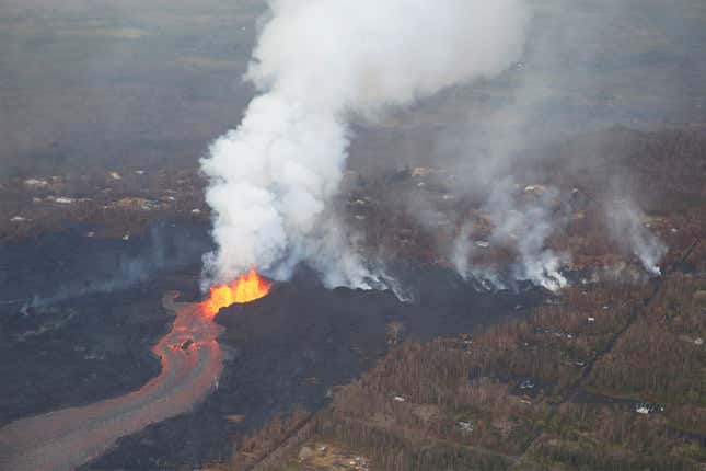 Image for article titled New aerial photos show Kilauea’s lava devouring neighborhoods