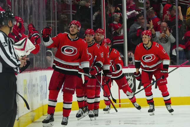 May 5, 2023; Raleigh, North Carolina, USA; Carolina Hurricanes center Jesperi Kotkaniemi (82) scores a goal against the New Jersey Devils during the second period in game two of the second round of the 2023 Stanley Cup Playoffs at PNC Arena.