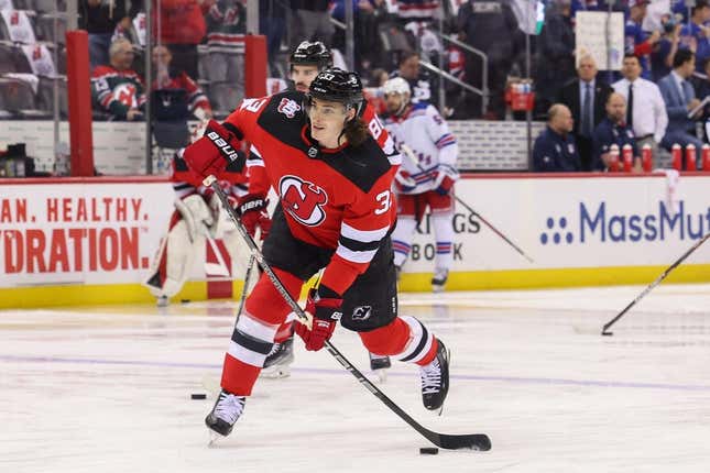 Apr 20, 2023; Newark, New Jersey, USA; New Jersey Devils defenseman Ryan Graves (33) shoots the puck during warmups against the New York Rangers before game two of the first round of the 2023 Stanley Cup Playoffs at Prudential Center.