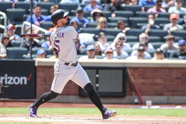 May 7, 2023; New York City, New York, USA; Colorado Rockies designated hitter Randal Grichuk (15) hits a home run in the first inning against the New York Mets at Citi Field.